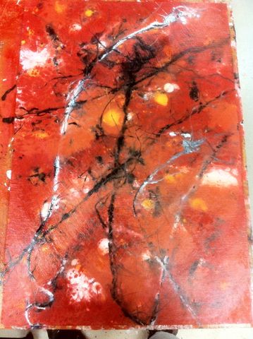 Process shot of a faux red marble.