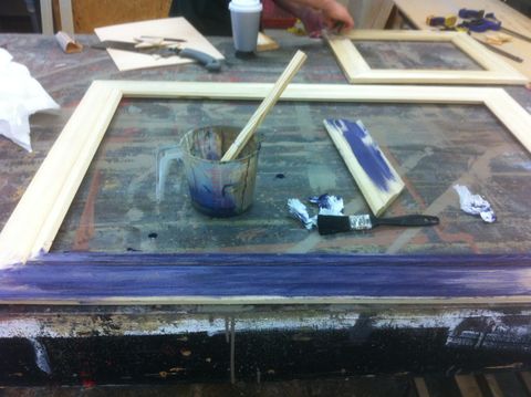 Painting the art frame. A pickling technique was used to allow the wood grain to show through.