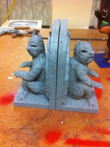 Final painted papier mache gargoyle bookends.