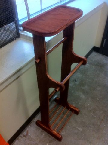 Process shot of staining the pants butler.