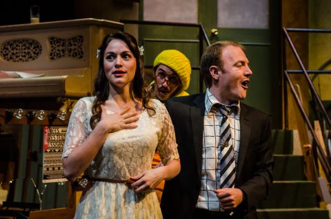 A close view of an actress, the producer, and the director from the play Dove.